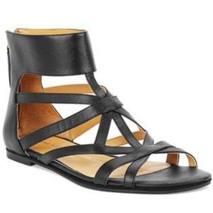 Nine West Hakuna Caged Flat Sandals in Black